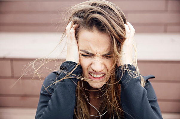 woman stressed out due to having lice